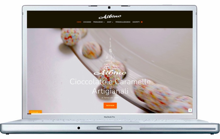 Caramelle e Cioccolato Albino — Nell’immagine, l’anteprima della homepage del sito mostra un fotogramma tratto dal video di lavorazione dei Cri-Cri, dolce tipico della tradizione piemontese.